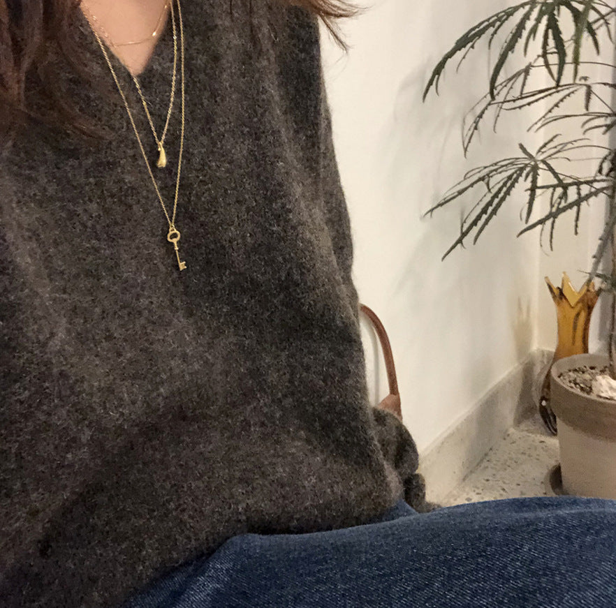 Magnifique collier en forme de clé. Très mignon avec classe