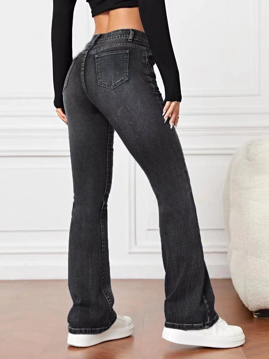 Pantalon bootcut ample et amincissant en denim taille haute moyenne. Patte Semi étroite