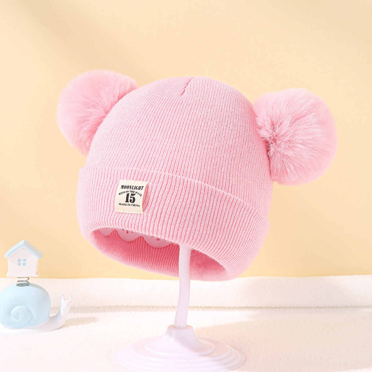 Bonnet bébé automne et hiver en laine cozy pour les tout petits.