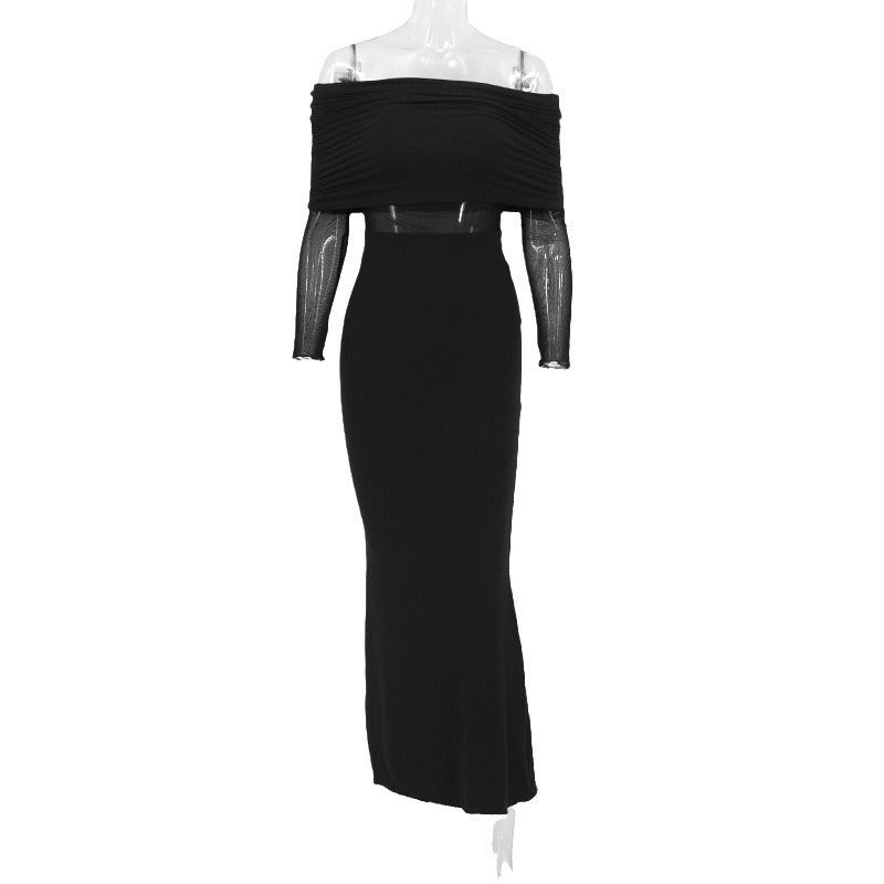 Robe longue noir très élégante . Épaule dégager tissu mince léger.