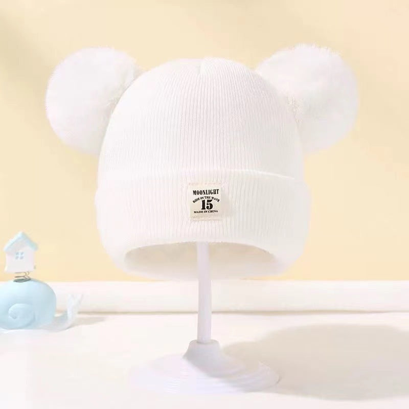Bonnet bébé automne et hiver en laine cozy pour les tout petits.