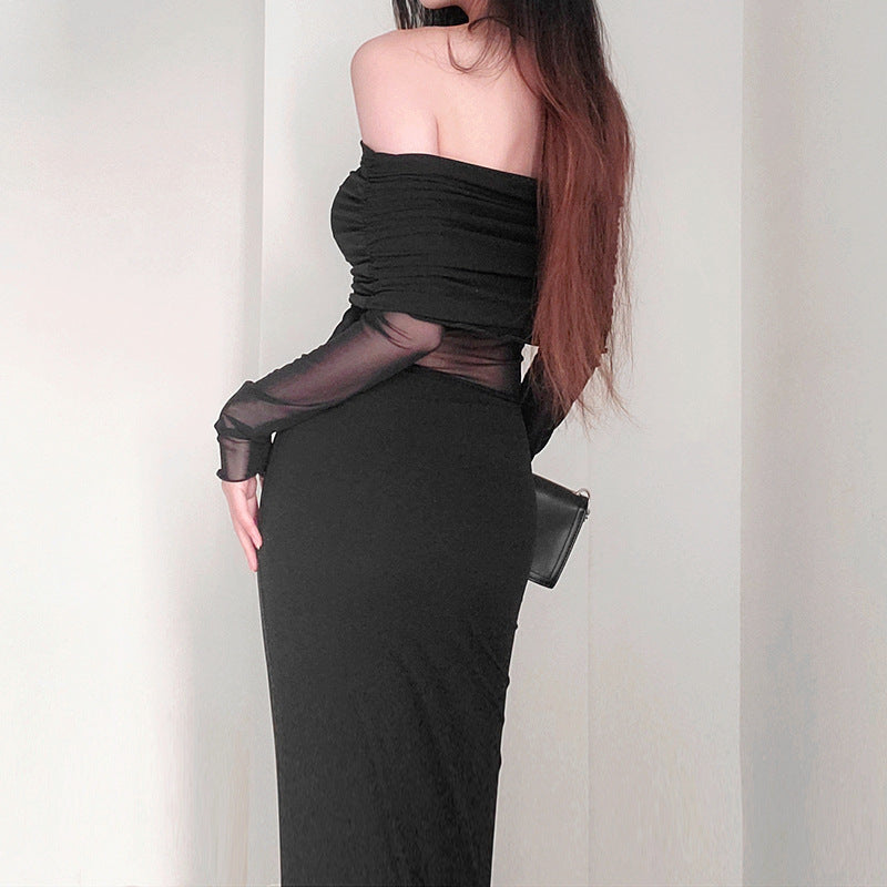 Robe longue noir très élégante . Épaule dégager tissu mince léger.