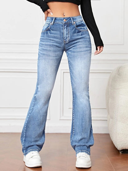 Pantalon bootcut ample et amincissant en denim taille haute moyenne. Patte Semi étroite