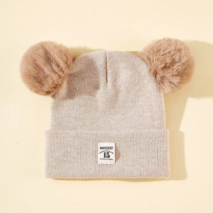 Bonnet bébé automne et hiver en laine cozy pour les tout petits.