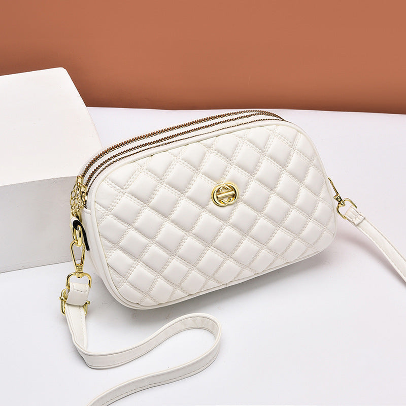 Petit sac chic en diamant style Chanel pour femme. Disponible plusieurs couleurs.