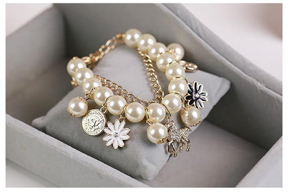 Magnifique bracelet a perle rond.