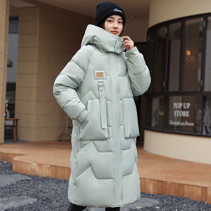 Magnifique manteau long duvet,  chaud, cozy et classique.  Couleur unie pour femme .