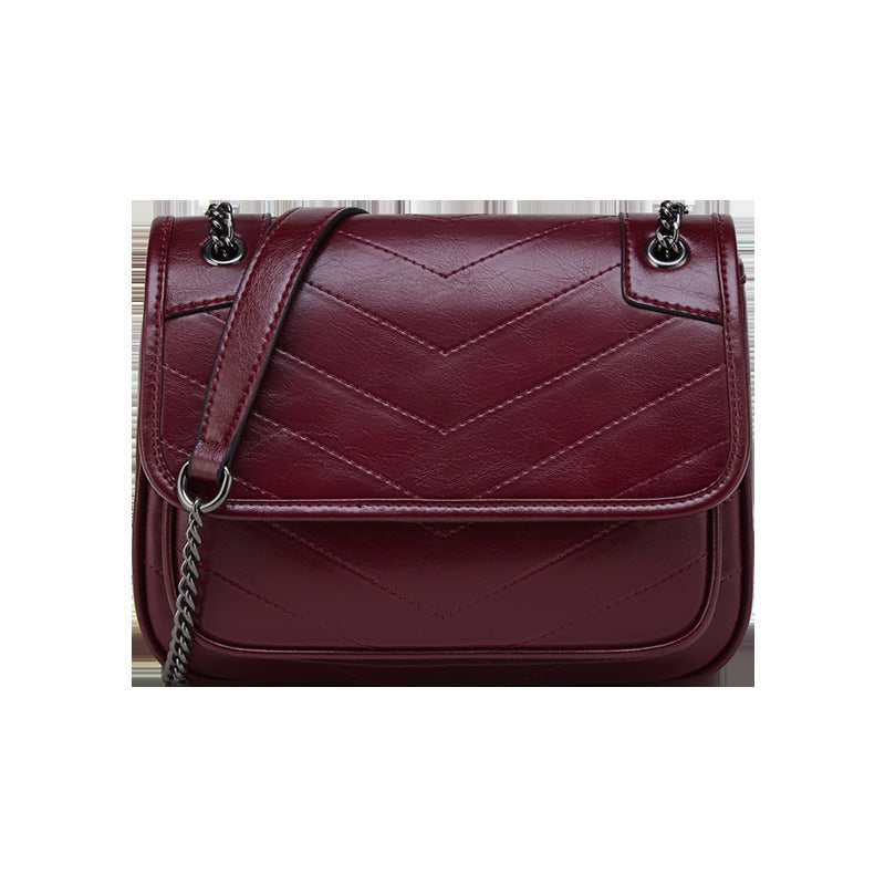 Sac à bandoulière en cuir pour femme très élégante.