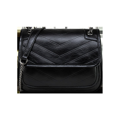 Sac à bandoulière en cuir pour femme très élégante.