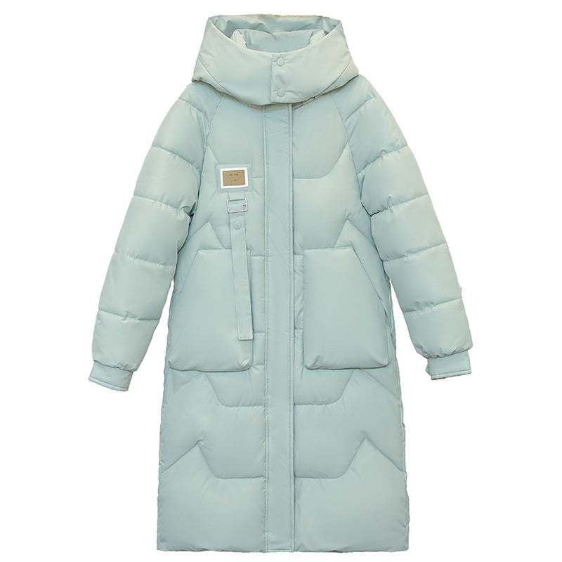 Magnifique manteau long duvet,  chaud, cozy et classique.  Couleur unie pour femme .