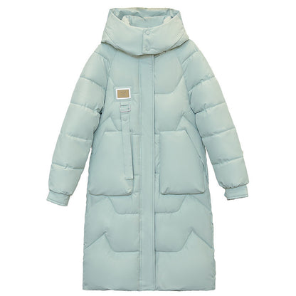 Magnifique manteau long duvet,  chaud, cozy et classique.  Couleur unie pour femme .