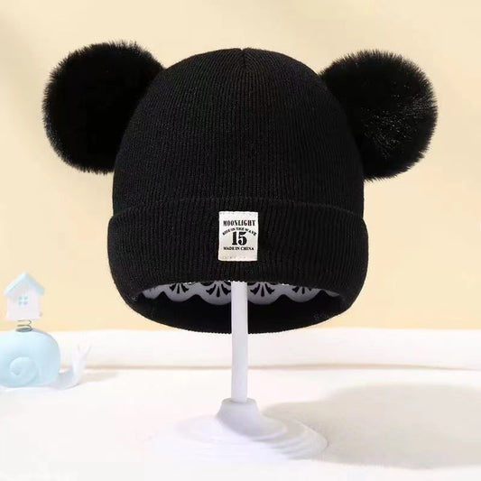 Bonnet bébé automne et hiver en laine cozy pour les tout petits.