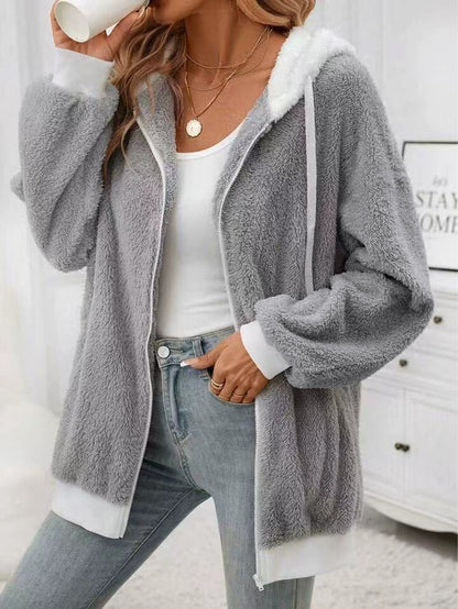 Veste en laine doux cozy avec zipe et capuche. Tendance pour femme