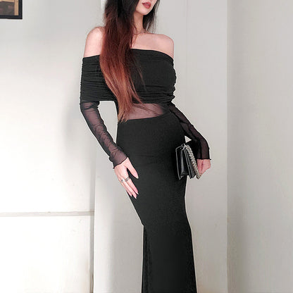 Robe longue noir très élégante . Épaule dégager tissu mince léger.