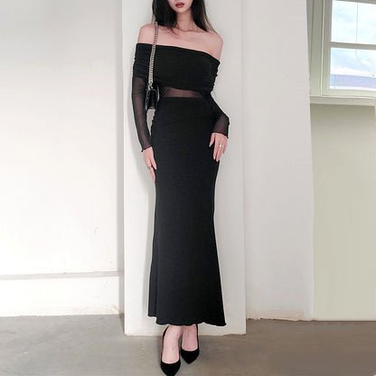 Robe longue noir très élégante . Épaule dégager tissu mince léger.