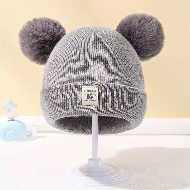 Bonnet bébé automne et hiver en laine cozy pour les tout petits.