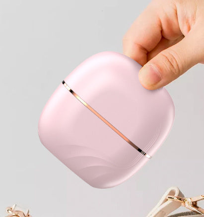 Mini peigne lisseur sans fil, portable et multifonctionnel, pour un soin des cheveux sans abîmer. Petit et très pratiques