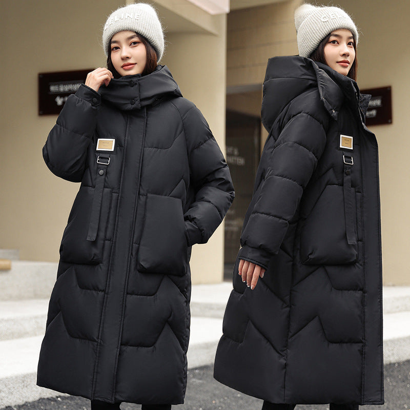 Magnifique manteau long duvet,  chaud, cozy et classique.  Couleur unie pour femme .