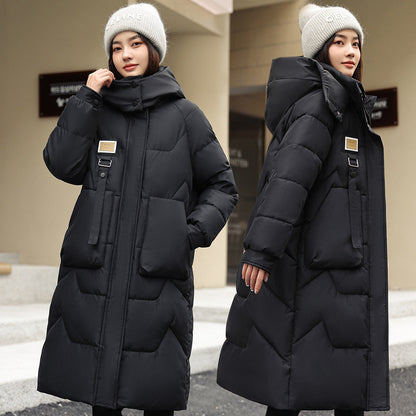 Magnifique manteau long duvet,  chaud, cozy et classique.  Couleur unie pour femme .