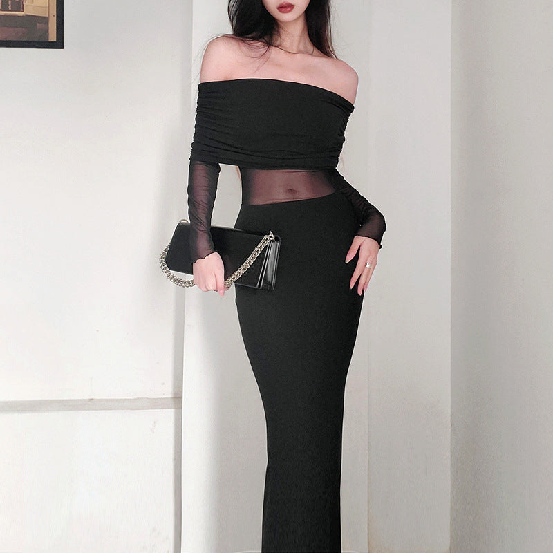 Robe longue noir très élégante . Épaule dégager tissu mince léger.