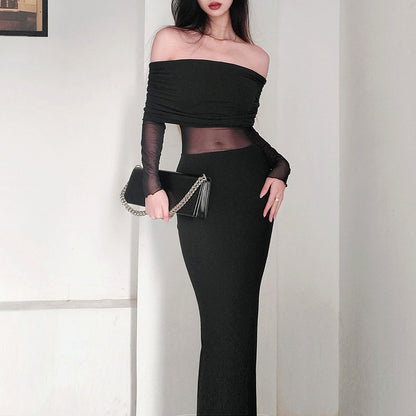 Robe longue noir très élégante . Épaule dégager tissu mince léger.