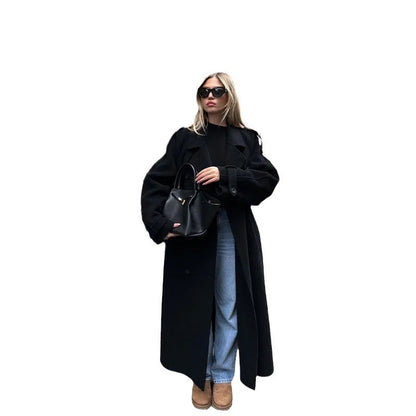 Très beau manteau long noir . Élégant cozy . Il te faut se manteau pour ton nouveau style.