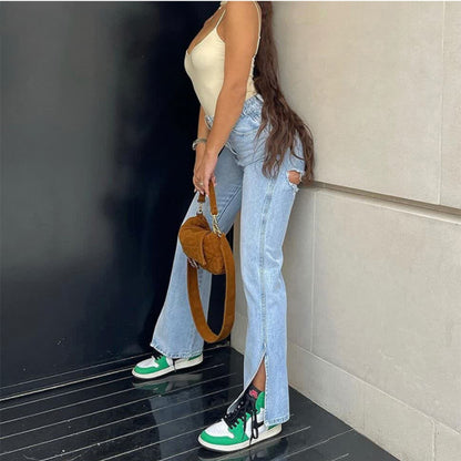 Pantalon en jean extensible avec ourlet déchiré et fentes pour femme. Confortable et stylée taille haute