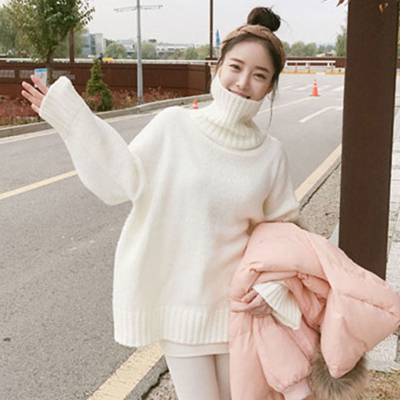 Pull col roulé couleur unie