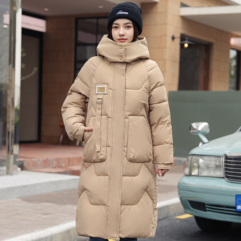 Magnifique manteau long duvet,  chaud, cozy et classique.  Couleur unie pour femme .