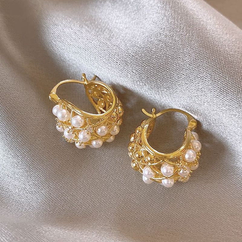 Magnifique boucle d'oreille avec de mini Pearl