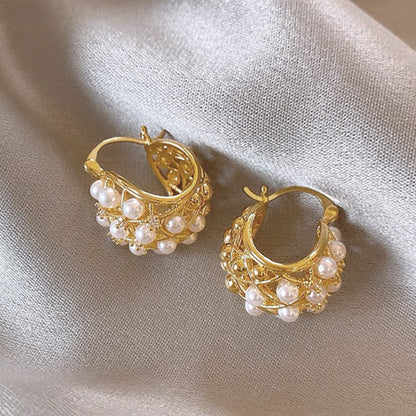Magnifique boucle d'oreille avec de mini Pearl