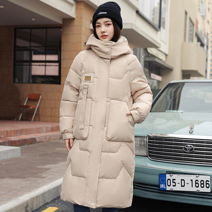Magnifique manteau long duvet,  chaud, cozy et classique.  Couleur unie pour femme .
