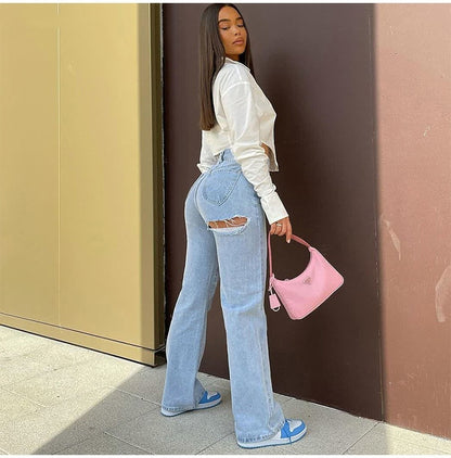 Pantalon en jean extensible avec ourlet déchiré et fentes pour femme. Confortable et stylée taille haute
