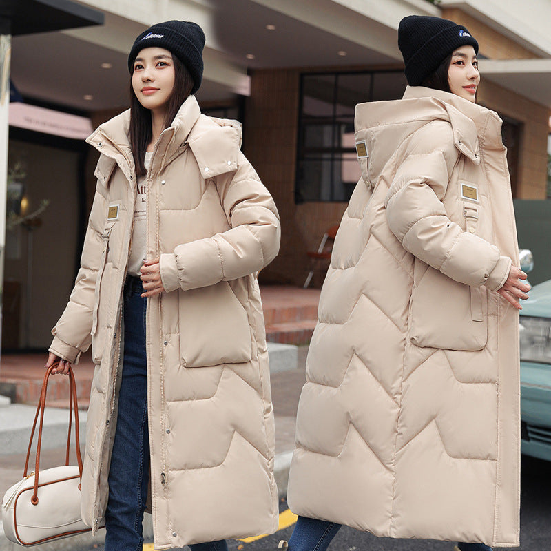 Magnifique manteau long duvet,  chaud, cozy et classique.  Couleur unie pour femme .