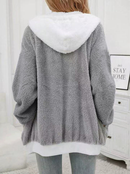 Veste en laine doux cozy avec zipe et capuche. Tendance pour femme