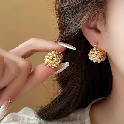 Magnifique boucle d'oreille avec de mini Pearl
