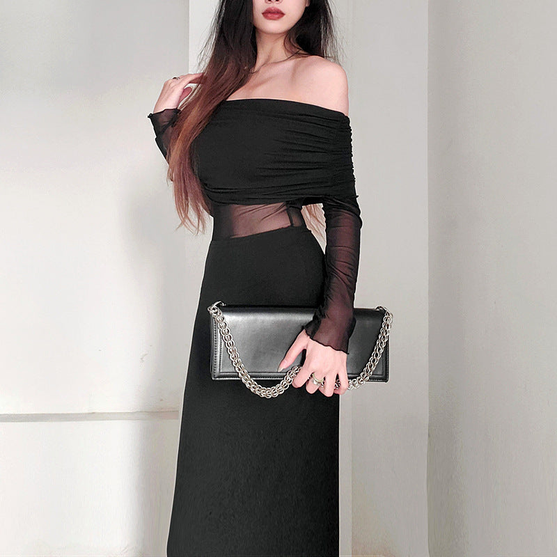 Robe longue noir très élégante . Épaule dégager tissu mince léger.