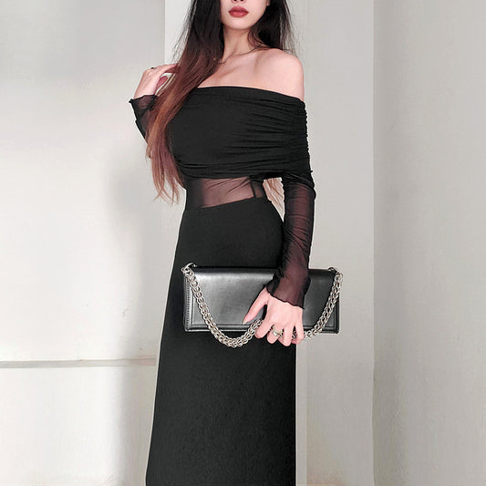 Robe longue noir très élégante . Épaule dégager tissu mince léger.