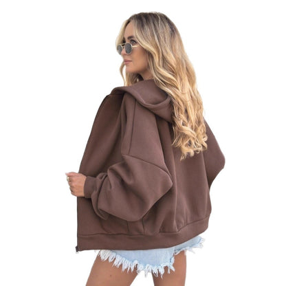 Manteau a zipe avec capuche cozy parfait pour la petite fraîcheur.