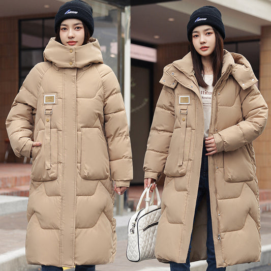 Magnifique manteau long duvet,  chaud, cozy et classique.  Couleur unie pour femme .