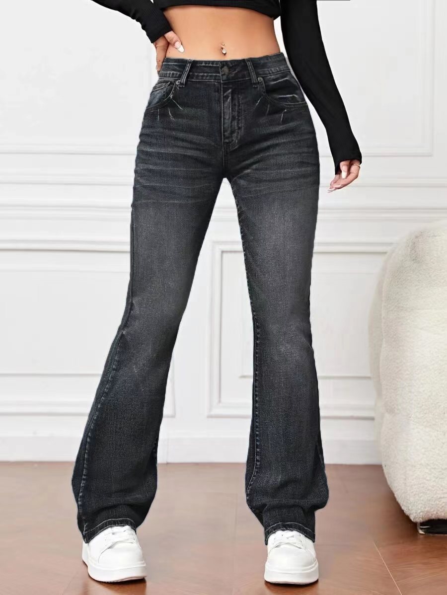 Pantalon bootcut ample et amincissant en denim taille haute moyenne. Patte Semi étroite