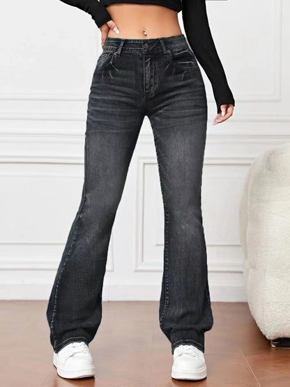 Pantalon bootcut ample et amincissant en denim taille haute moyenne. Patte Semi étroite