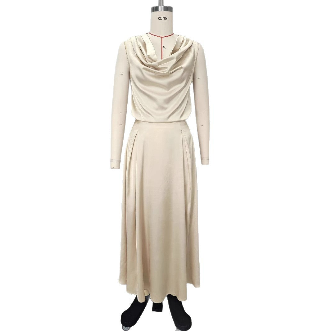 Sleeveless Scooped-neck Top Paired With A Pleated Skirt