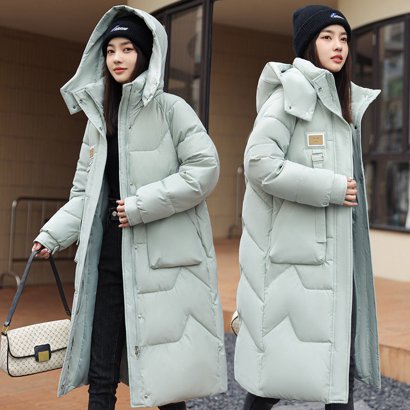 Magnifique manteau long duvet,  chaud, cozy et classique.  Couleur unie pour femme .