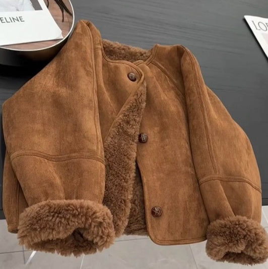 Manteau vintage en fausse fourrure à col rond avec une touche mode