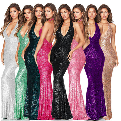 Très belle robe longue a dos nu. ouverture en v couleurs unie , très chic.